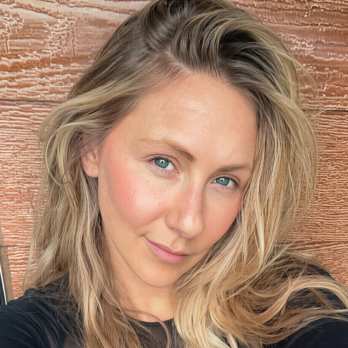 The same selfie crop after Pure Rez upscaling, with sharp skin, lash and iris detail